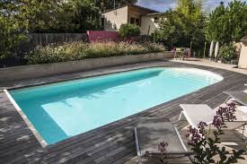 l esprit familial par l esprit piscine piscine 11 x 4 5 m revetement sable escalier roman en bout de bassin outdoor outdoor decor pool