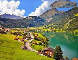 Interlaken in the canton of bern is a well known tourist destination in the bernese oberland located between lake brienz and lake thun in switzerland. Discover The Beauty Of Interlaken Switzerland Town Among Lakes