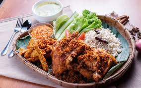 Ayam penyet (javanese for smashed fried chicken) is indonesian — more precisely east javanese cuisine — fried chicken dish consisting of fried chicken that is smashed with the pestle against mortar to make it softer, served with sambal, slices of cucumbers, fried tofu and tempeh. Ayam Penyet Terbaik Di Sekitar Lembah Klang Free Malaysia Today Fmt