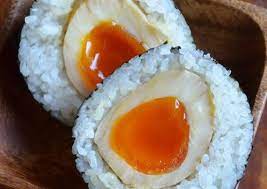 Rich And Exquisite Onigiri With Seasoned Soft Boiled Eggs Recipe By Cookpad Japan Recipe Onigiri Recipe Soft Boiled Eggs Recipe Recipes