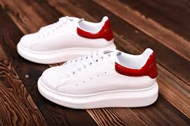 Alexander Mcqueen Spray Paints Oversized Sneakers Black And White Alexander Mcqueen Men S White And Red Oversized Sneakers Leather Low Top Sneakers Alexander Mcqueen Sneakers Alexander Mcqueen Shoes Alexander Mcqueen Men