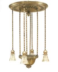 Glass shade chandeliers come in different heights and styles. American Art Deco Silver Plate And Mercury Glass Chandelier
