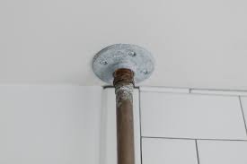 Finding a suitable shower curtain rod for my clawfoot tub and angled ceiling was near impossible (unless i wanted to spend over $300). Diy Copper Pipe Shower Curtain Rod Abigail Green