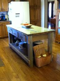 Kitchen Island Made From Old Barn Wood Pallet Wood And My Grandmothers Old Door Thanks To My Husband Who M Wood Kitchen Island Wood Kitchen Barn Door Decor