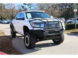 2010 toyota tundra 4x4 double cab sr5 1 owner, well maintained w 27 service records, sr5 package, trd package, 5.7l 4wd/awd, abs description: Lifted Tundra Features Totally Awesome 80s Design Yotatech