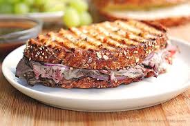 Pour a small dish of reduced jus. Roast Beef Panini