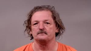 Ravenna man arrested in Warren, facing gun charges