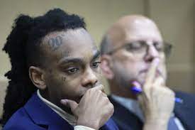 Masked detective prevents YNW Melly from facing accuser in murder trial,  defense attorneys say | AP News