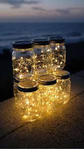 Pin By Andrea Hamacher On Vintage Wedding Jar Centerpiece Wedding Wedding Lights Fairy Lights Wedding