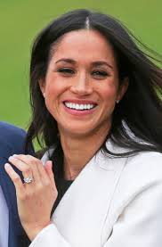 Wait, meghan markle updated her engagement ring so it has more diamonds. The Heartwarming Meaning Behind Meghan Markle S Diamond Engagement Ring Vogue