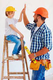 We are a licensed, bonded and insured company to make sure everything goes perfect with the. High Five Well Done Dude Father And Son Repair The House Stock Photo Picture And Royalty Free Image Image 60313512