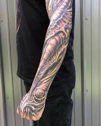 Striking beautiful sleeve tattoo designs for boys and men. Forearm Bio Sleeve Tattoo By Guy Aitchison Tattoonow