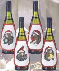 Sometimes called the japanese utility apron, this style of pinafore apron lends itself to a variety of situations. Christmas Hedgehog Wine Bottle Aprons Cross Stitch Kit By Permin Of Copenhagen