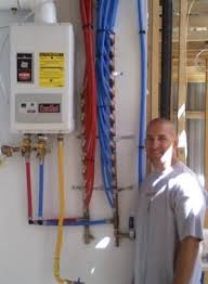 Tankless Water Heater With Pex Piping System For Our House Size And Region A Tankless System Water Heater Woul Diy Plumbing Pex Plumbing Radiant Floor Heating