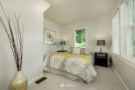 First floor master bedroom has built in bed and surround, double closet, and en suite bath with heated floors. For Sale 10750 Stone Avenue N Seattle Wa 98133 617 000 Mls 1795468