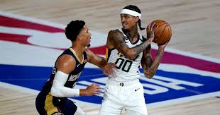 When done right, a fade haircut can give you the desired effect and make you look dapper—without much effort. Jazz Vs Pelicans As Nba Returns Jordan Clarkson S Weave Has Fans Wondering About His Lockdown Hair Plan Meaww