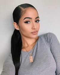 This slick back ponytail with an undercut looks so damn awesome thanks to that perfectly combed hair. Baby K Slicked Back Ponytail Hair Styles Natural Hair Styles