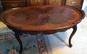 Discover all precious riva 1920 furniture in natural wood available in a wide range of features such as finishes, essences, design and much more. 1920 S Oval Wooden Coffee Table Inlaid Top Carved Top Ends And Legs Collectors Weekly