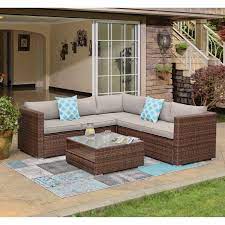 Whatever you need for your home, chances are good that wayfair has it. Wrought Studio Newagen 4 Piece Outdoor Furniture Set Mottlewood Brown Wicker Sofa W Warm Gray Cushions Glass Coffee Table 2 Teal Pillows Incl Waterproof Cover Reviews Wayfair