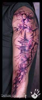 Cherry blossom tattoo at tummy. Cherry Blossom Temple Japanese Arm Color Arm Sleeve Tattoos For Women Blossom Tattoo Tattoos For Women Half Sleeve