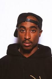 Guyz a true fan of Tupac should answer this. 1.The name of Tupac father  2.The name of Tupac wife