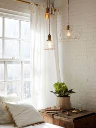 The bare whitewash brick wall creates a mesmerizing and refreshing foundation in the overall charming and beautiful bedroom. Interiors Tribeca Loft Brick Wall Bedroom Brick Interior Painted Brick Walls