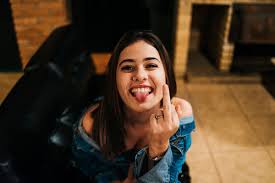 Maybe some poses don't work correctly, because some of them are really near to the body. Woman Sticking Out Her Tongue And Raising Her Left Middle Finger Nohat Free For Designer