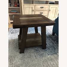 Not only do they add interesting accents how often have you sat down on a couch or bed and realized you had nowhere to put your carefully poured cup of coffee or glass of wine but the floor? Rooms To Go Cedar Creek Brown End Table Aptdeco