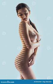 Beautiful Naked Woman Posing with Blinds Shadow on Body Isolated on Blue  Background Stock Photo - Image of adult, brest: 83042350
