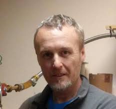 Comparative analysis of particle irradiation and second-phase additions  effects