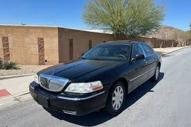 Image result for Light Ice Blue 2007 Town Car