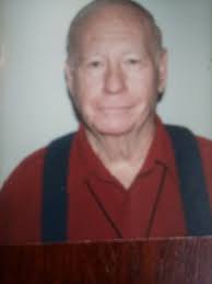 18625 Jack and Shirley Olson taking a break from yard work and getting  ready to fire up the grill. Shirley now lives in Estes Park, CO. Jack  passed away in 1975.