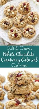 Easy Soft And Chewy Oatmeal Cookies Packed With White Chocolate Chips And Dri Oatmeal Cookies Chewy White Chocolate Cranberry Cookies Oatmeal Cranberry Cookies
