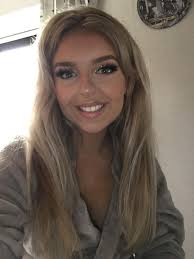 A picture of a lovely young lady called Connie Watson. Connies family have  had a very difficult year and we hope that our charity has provided some  support! She's doing the New