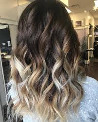 Lee is also responsible for this balayage look, which uses a base of dark brown hair to make caramel blonde highlights pop. 25 Fabulous Looks With Blonde Highlights On Brown Hair