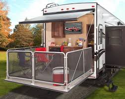 Stylish Bunkhouse With Fold Down Deck Patio Under Folding Canvas Chairs Outdoor Furniture And Portab Outdoor Kitchen Design Outdoor Kitchen Diy Outdoor Kitchen
