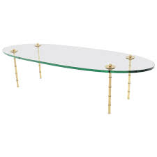 See 12 of our favorite glass coffee tables that are sure to enhance your living room. Turned Brass Faux Bamboo Legs Thick Glass Top Oval Coffee Table Soho Treasures