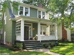 The living area flows freely into the foyer, kitchen and dining alcove. Green Modern Exterior House Paint Novocom Top