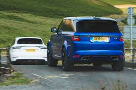 Hot Suv Twin Test Porsche Cayenne Turbo Vs Range Rover Sport Svr Autocar