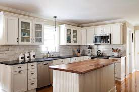 If the cabinet has no crown, this kind of molding can make your cabinets look more significant, and the some unwanted edges or gaps may appear when some pieces of metal or two panels are connected perpendicularly. White Kitchen Cabinets Walcraft Cabinetry
