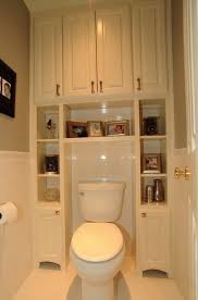 Small Space Storage Ideas Install Wall To Wall And Floor To Ceiling Shelves Around The Toilet Bathroom Storage Solutions Traditional Bathroom Home Remodeling