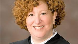 Abortion fight looms after Kelly picks Supreme Court justice