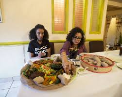 This is usually in the form of wat, a thick stew, served on top of injera , a large sourdough flatbread, which is about 50 centimeters (20 inches) in diameter and made out of fermented teff flour. How To Eat Ethiopian Cuisine Is Hands On The Star