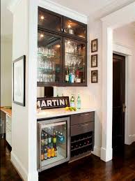 A pair of doors open wide when it's time to prepare a cup of espresso, brew tea, or percolate a pot of joe. 20 Stylish Small Home Bar Ideas Hgtv