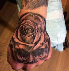 Rose And Skull Hand Tattoo For Men By Jezabell Morgan Jezabellmorgan Hand Tattoos For Guys Hand Tattoos Skull Hand Tattoo