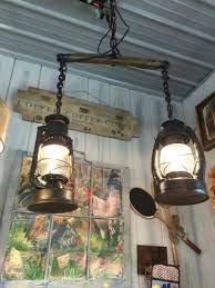 50 Farmhouse Lighting Ideas To Brighten Up Your Space In A Charming Way Farmhouse Lighting Diy Lighting Rustic Lighting