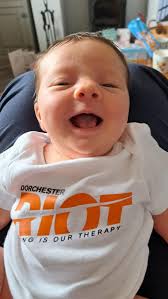 Message from Sam B and Baby Molly: Massive thank you to RIOT for Molly's  outfits. She's ready to join the RIOT team and was born with really long  legs ready to do