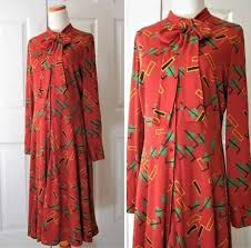 1970s diane von furstenberg dress bow collar button down long cuff sleeves burnt orange fall color abtract print size s m vintage 12