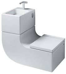 tiny bathroom sink, toilet