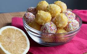 Brazilian Beijinho Recipe Coconut Brigadeiro Truffles Recipe In 2020 Recipes Giraffe Bread Recipe Beijinho Recipe